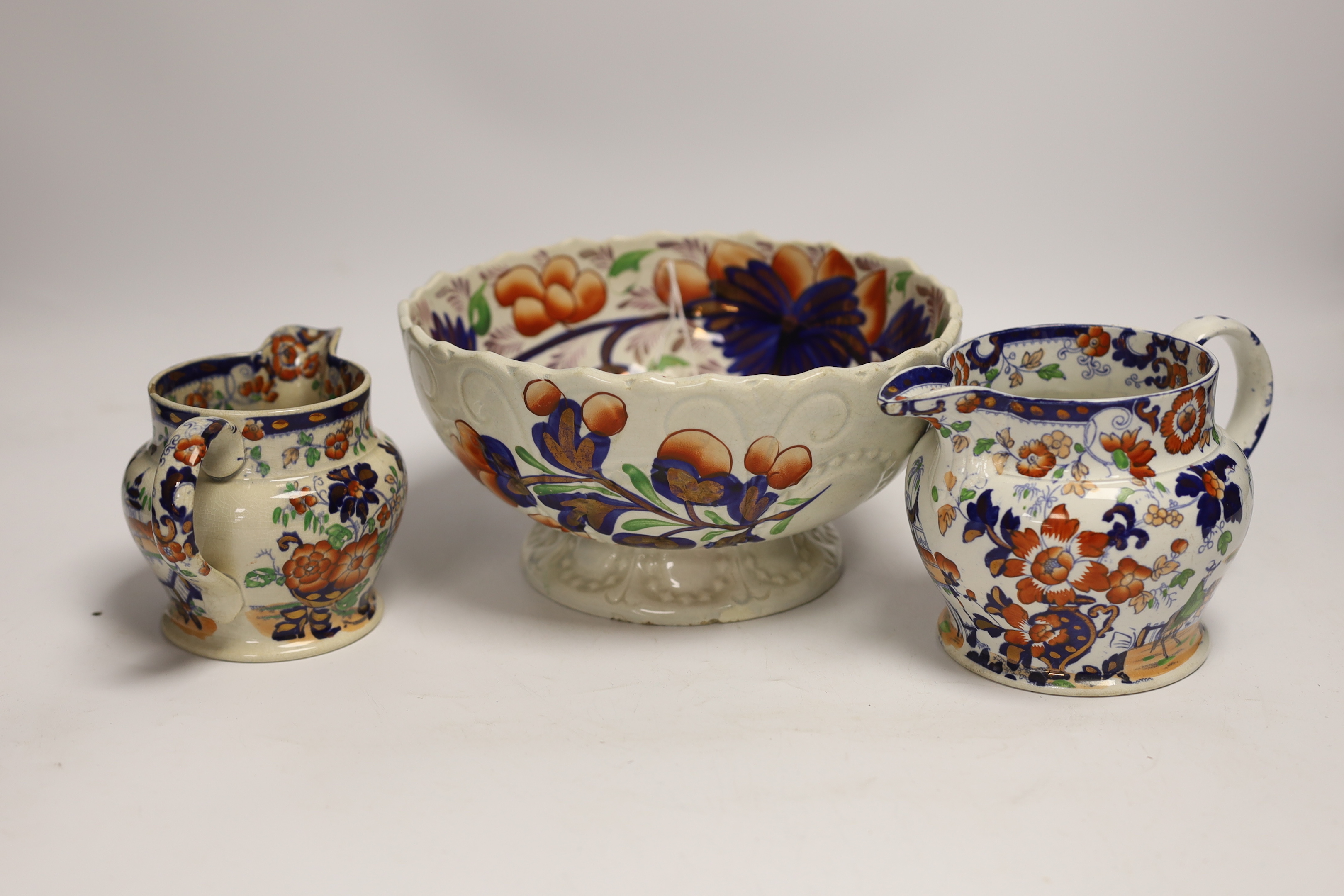 Five Welsh ‘Gaudy’ coffee cans, a large pedestal bowl and two Staffordshire jugs, bowl 21cm diameter